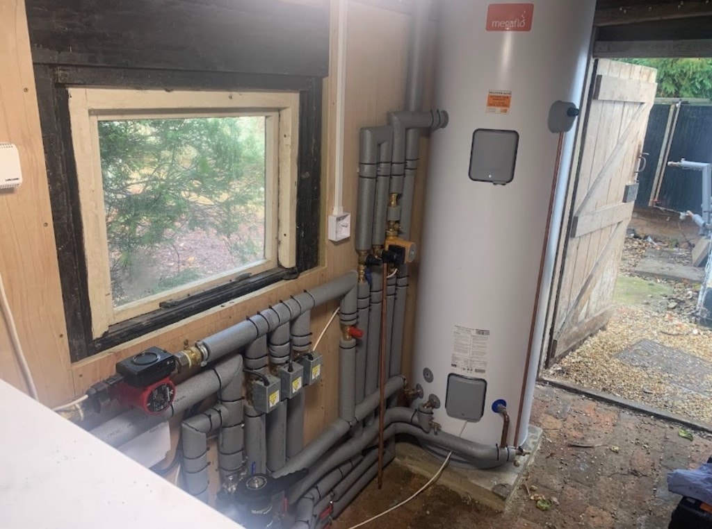 Megaflo hot water system with insulated copper pipework installed by APS