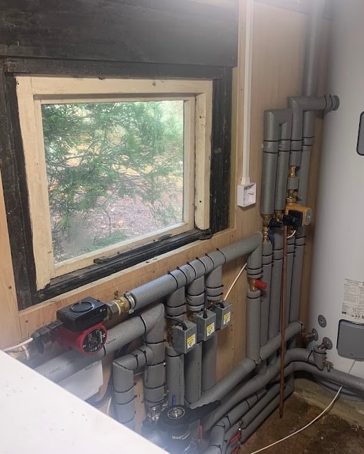 Megaflo hot water cylinder and central heating pipework installed by APS