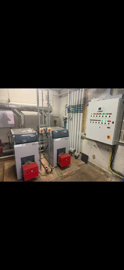 Commercial Ideal Evomax boilers in a primary school plant room in Chieveley